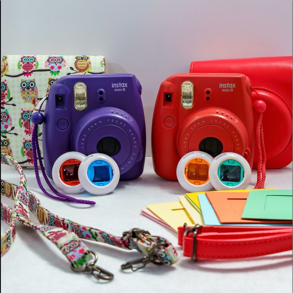 Instax mini film Polaroid cameras. (2 cameras with accessories)